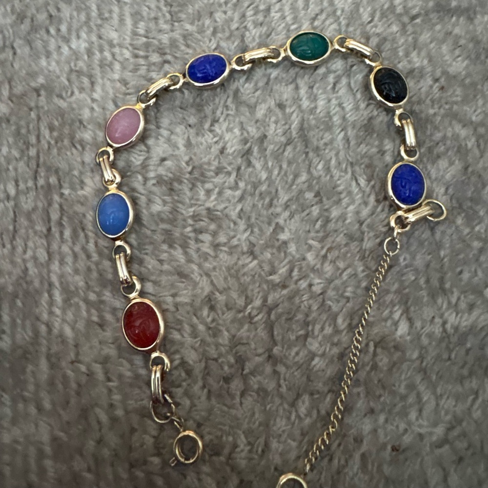 EUC multi stone gold tone bracelet